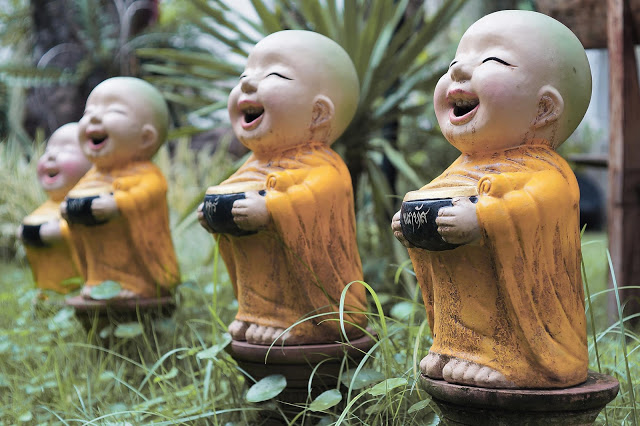 buddhist-monk-children-statues-1