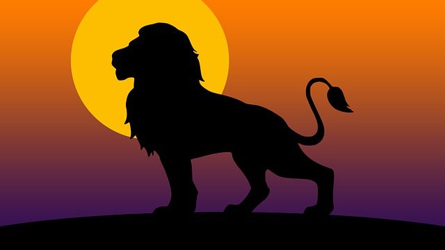 lion-illustration-black-on-orange-full-moon-background-small